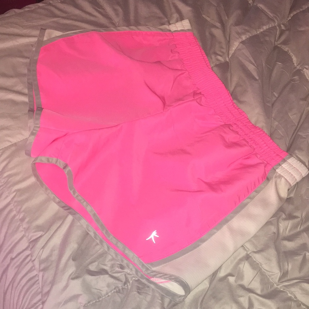 Pink running shorts